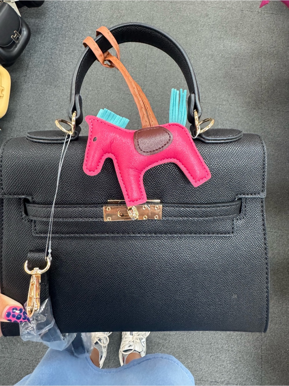 Black Structured Top-Handle Handbag with Pink Horse Charm